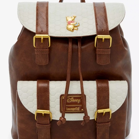Loungefly Disney Winnie the Pooh Honeycomb Flap Mini
Backpack - BoxLunch - Picture 1 of 9